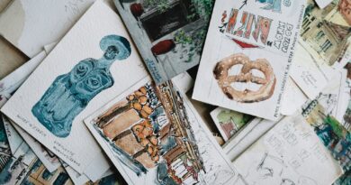 a pile of assorted cards with drawings on them