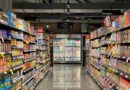 grocery store aisle with stocked shelves