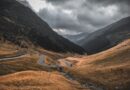 a winding road through a valley